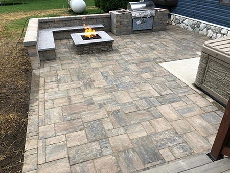 Paver Patio with Gas Firepit, Sitting Bench and Built In Grill